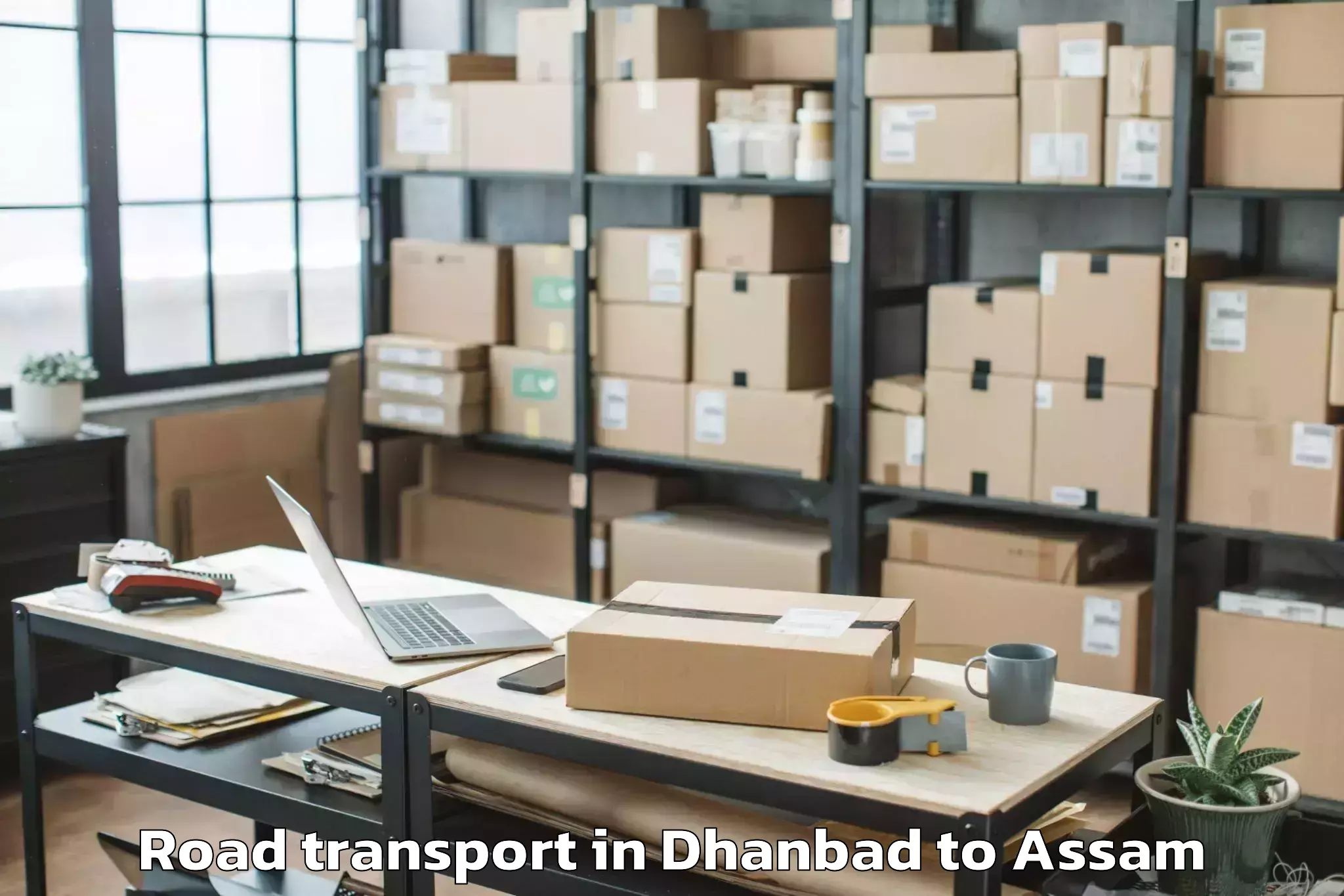 Easy Dhanbad to Darangamela Road Transport Booking